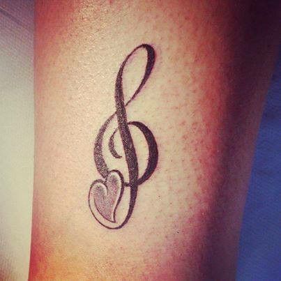 Blackwork music tattoo