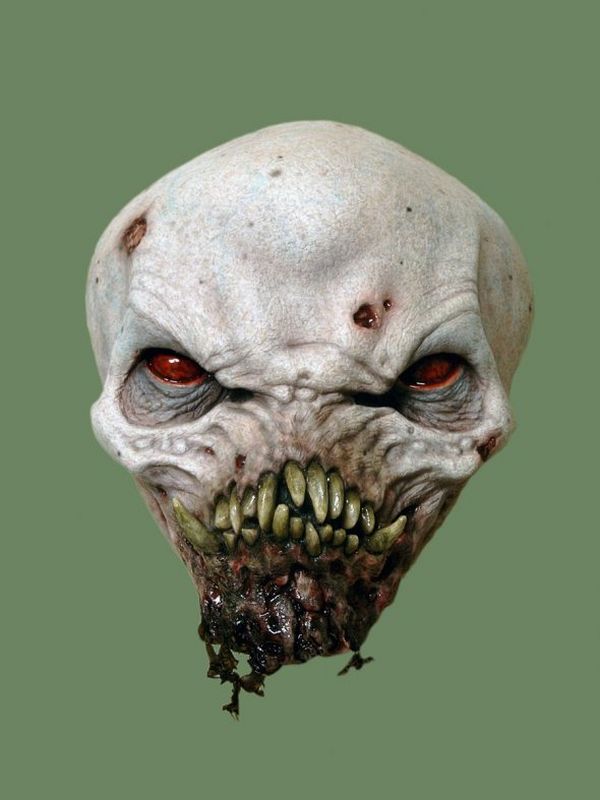Jordu Schell pale bulbous monster head with red eyes