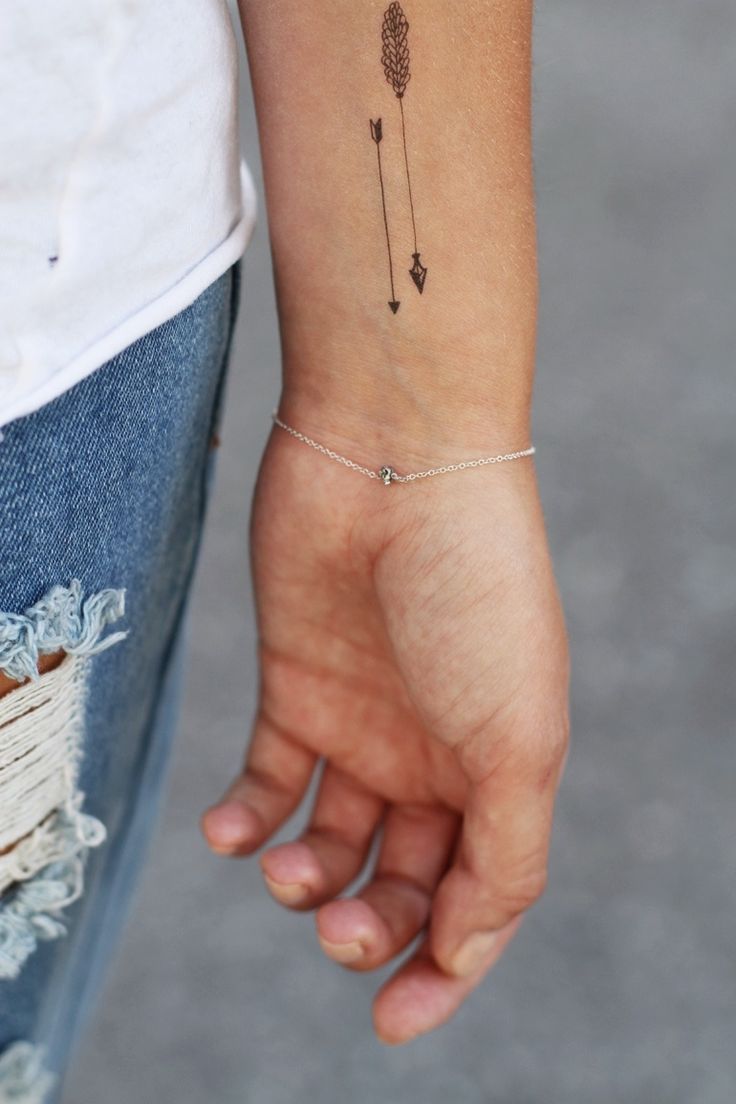 Arrow and feather tattoo idea
