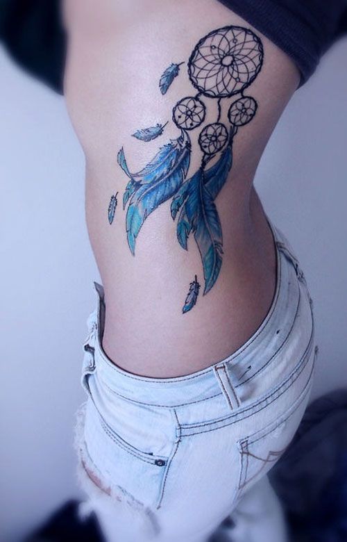 Dreamcatcher rib tattoo
