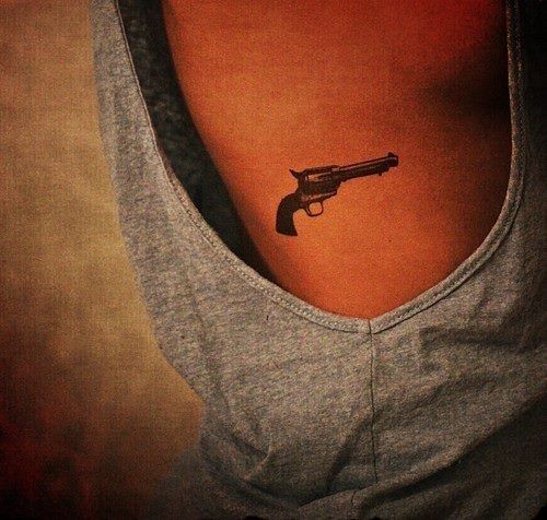 Clock or time rib tattoo