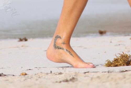 Paired foot tattoos