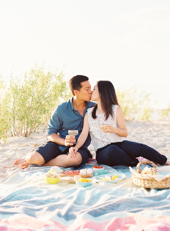 Couple on blanket with countryside view