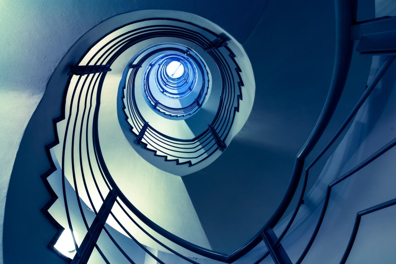 Joe Plasmatico blue-toned spiral staircase