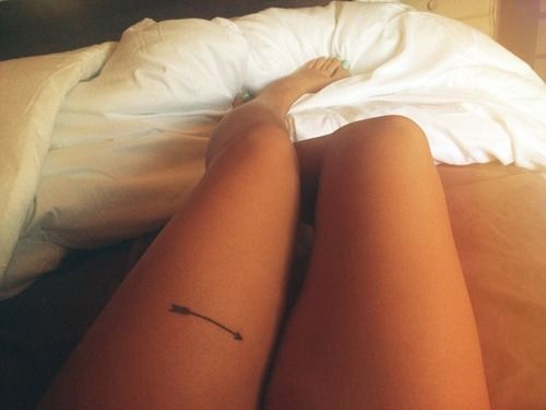 Classic arrow tattoo idea