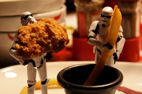Stormtroopers holding a chicken nugget and dipping a french fry
