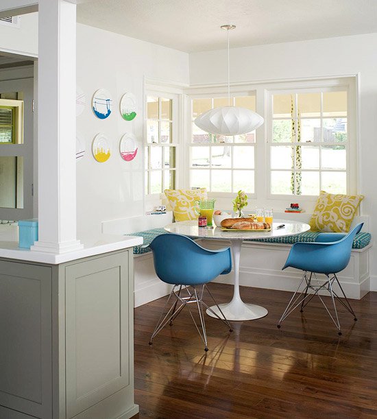 Mid-century nook with tulip table blue Eiffel chairs and bubble lamp
