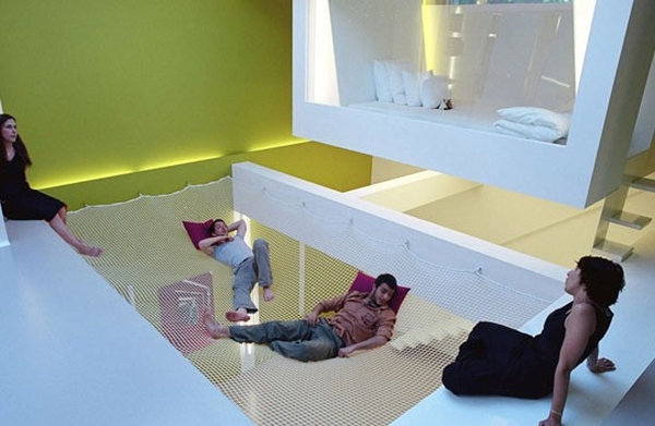Playful multi-level living space with open net lounge