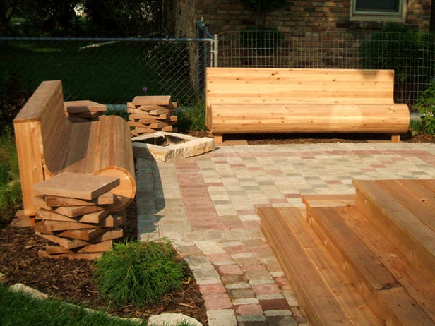Wooden bench paired with outdoor textiles