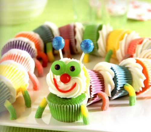 Pull-apart caterpillar cupcake cake with candy legs