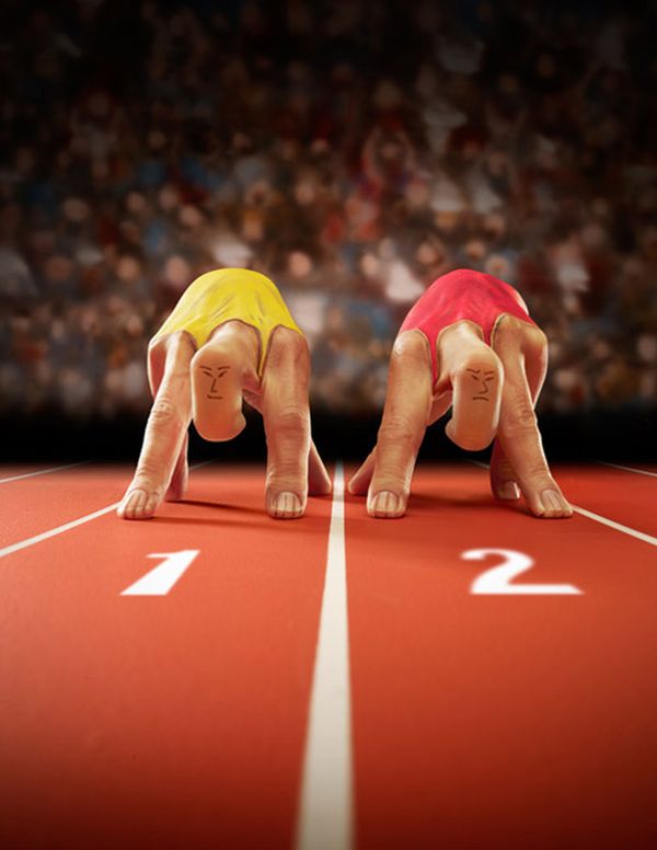Ray Massey hand painting of sprinters on a track
