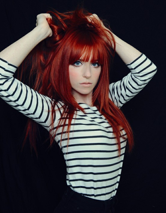 Styled red hair updo detail