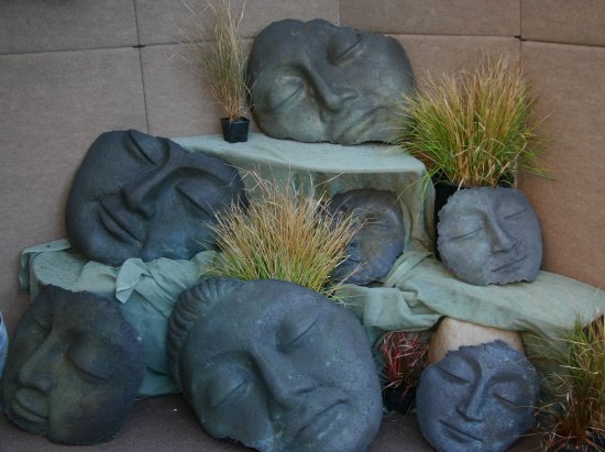 Low garden stones among plants