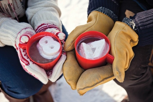Holiday engagement couple in seasonal scene