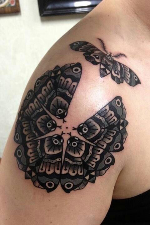 Behind-ear mandala tattoo