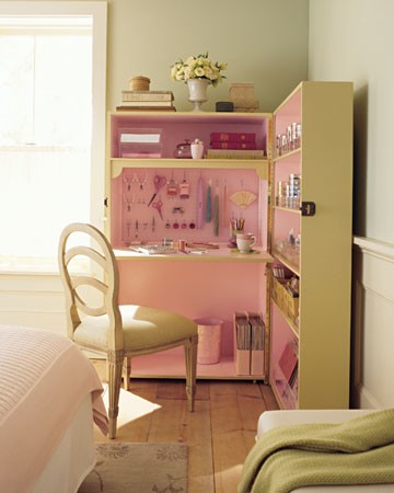 Hidden desk made from two hinged bookcases