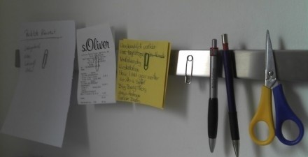 Magnetic knife rack used as office supply holder