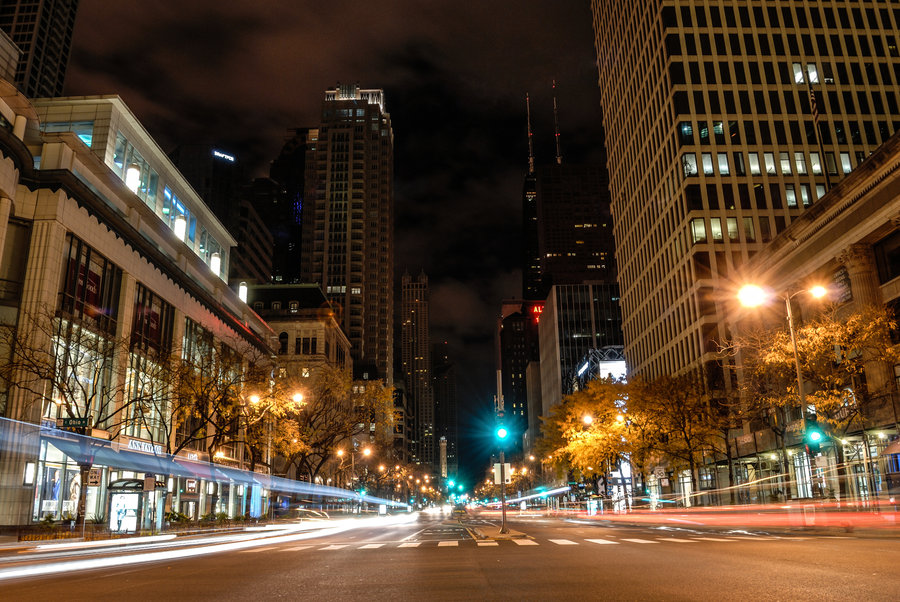 Urban night scene with streaking traffic and building lights