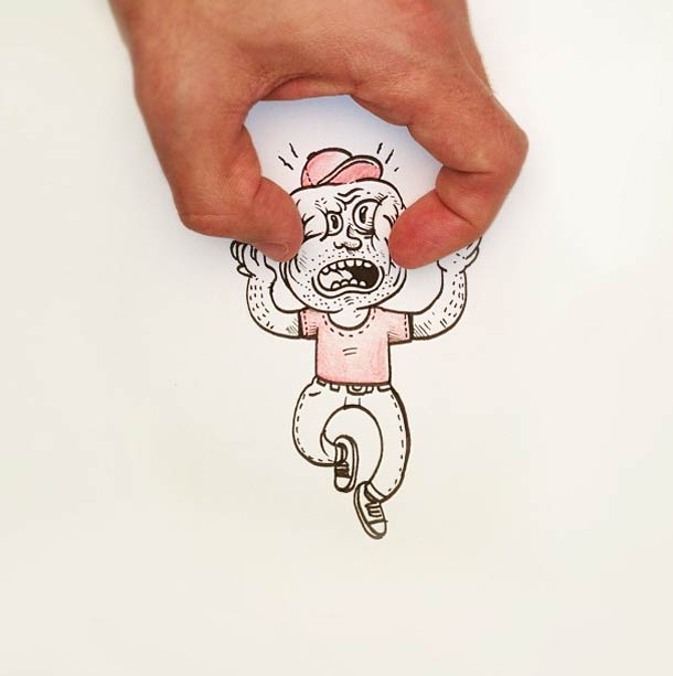 Hand squeezing a drawn character by the head