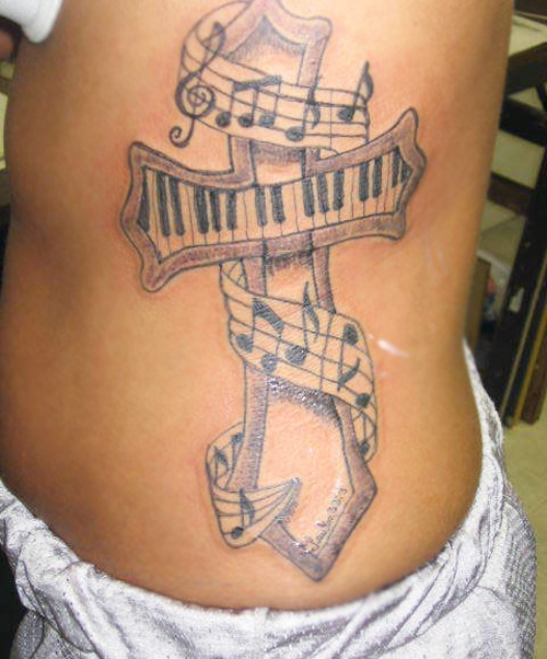 Microphone tattoo with notes
