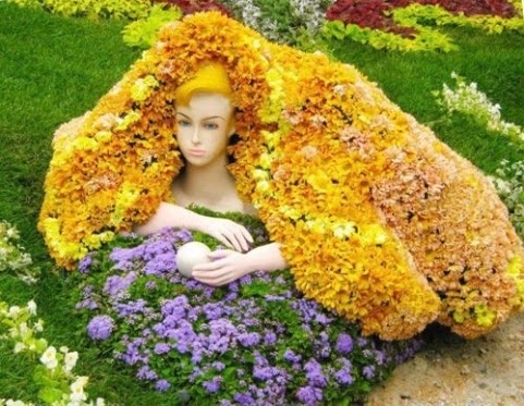 Floral clam-shell sculpture with pearl figure