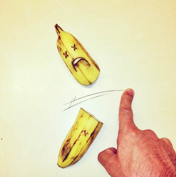 Banana sliced with finger slash lines drawn on the surface