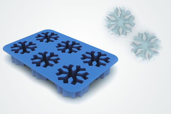 Blue silicone snowflake ice tray with finished snowflake cubes