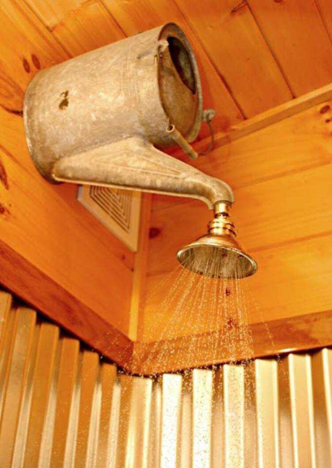 Turn an old watering can into a shower head for an outdoor shower.