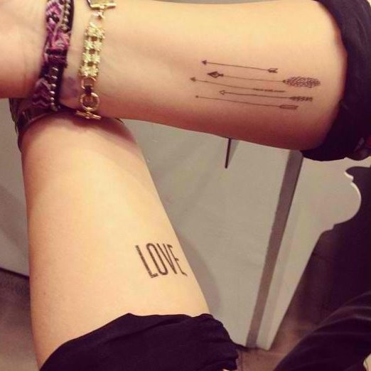 Compact arrow tattoo idea