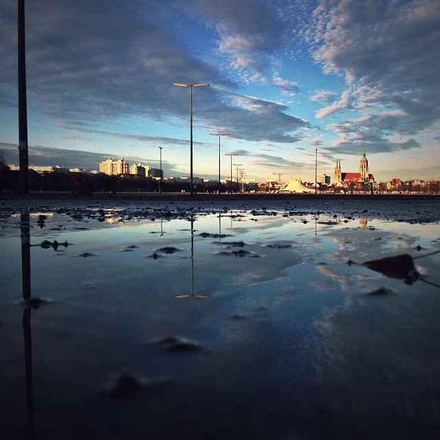 City reflection puddle by Paeders