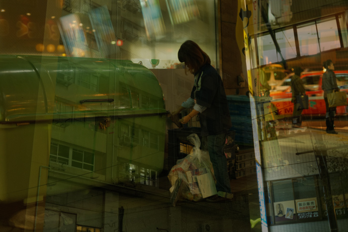 Yokohama night lights layered in Issui Enomoto Taxi in the Sea
