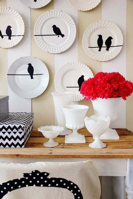 Colorful patterned plates on a dark wall