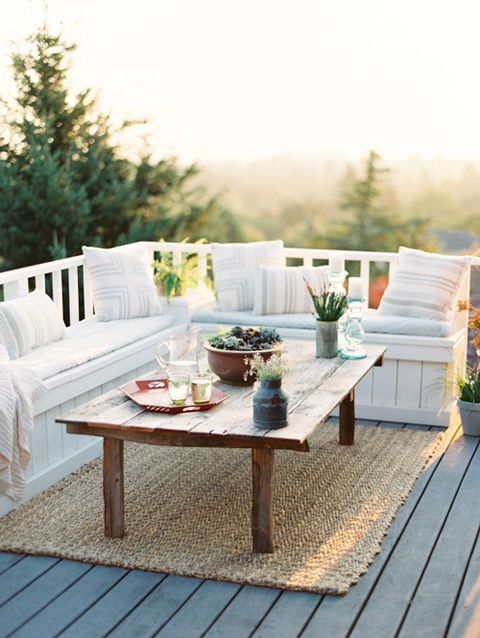 Outdoor bench with layered cushions