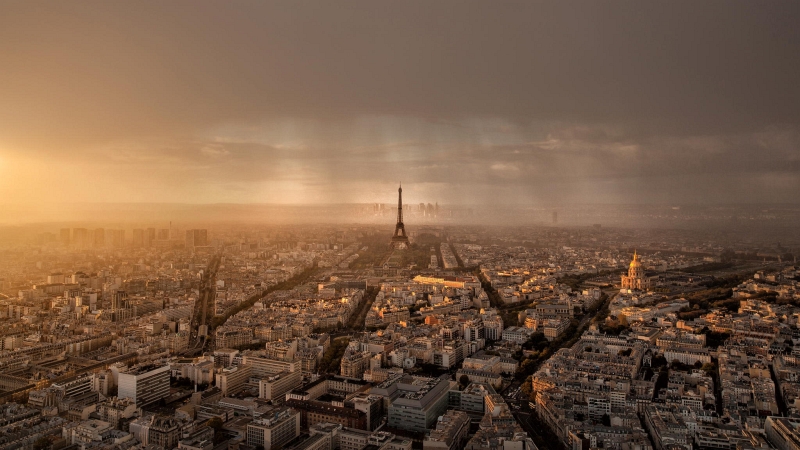 Eiffel Tower photograph emphasizing light and skyline