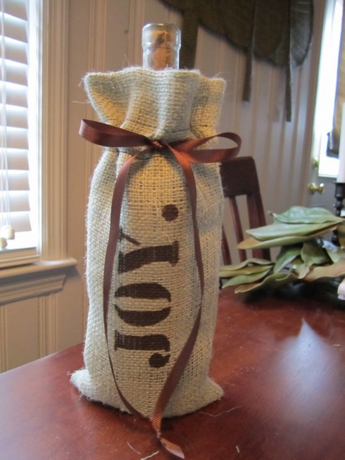 Wine bottle gift with textile wrap