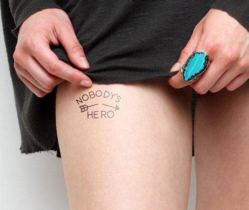 Arrow tattoo with script pairing