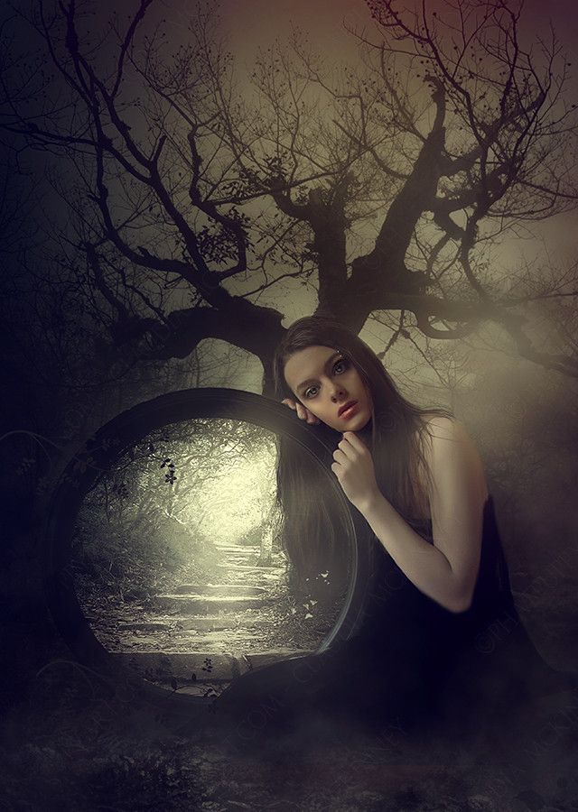 Woman with mirror in an atmospheric photographic study
