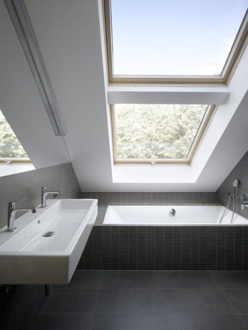 Attic bathroom with vertical storage emphasis