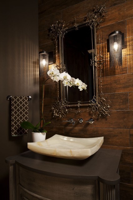 Tall sculptural sink and faucet pairing