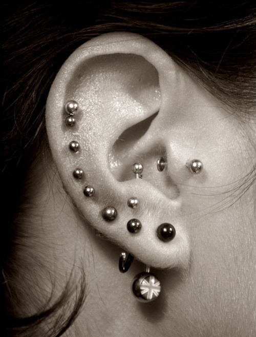 many helix studs tragus and Union Jack lobe