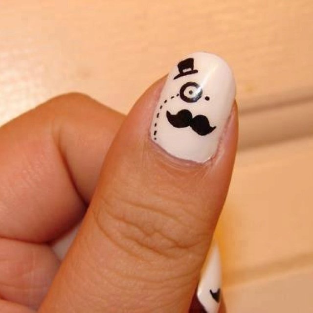 Bold mustache manicure design