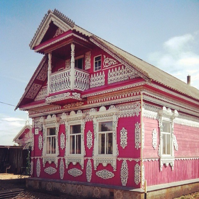 Traditional wooden Russian dwelling with porch detail