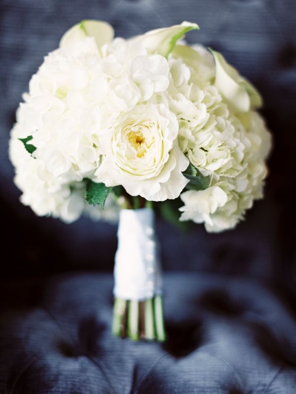 white hydrangea rose and calla lily bouquet with pearl pins