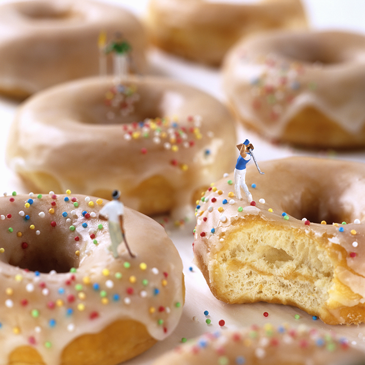 Tiny figures exploring food textures