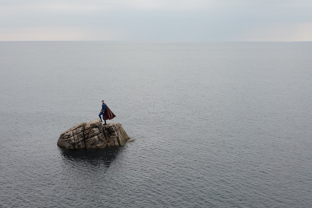 Another Quest for the Absolute landscape with a superhero figure