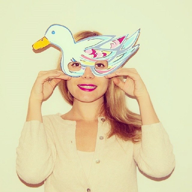 Duck in profile painted cardboard mask