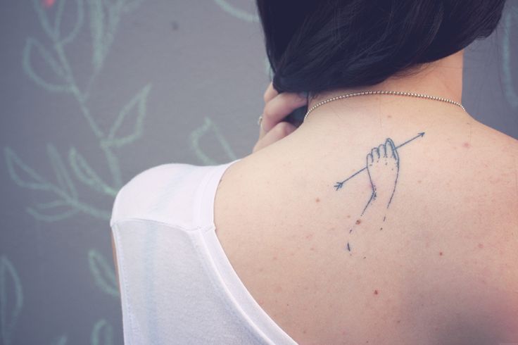 Arrow tattoo composition example