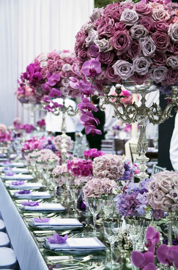 Purple floral banquet tablescape with silver candelabras